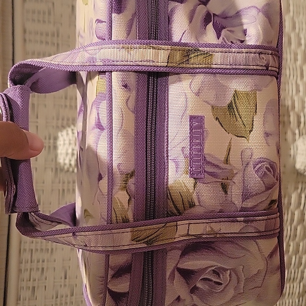 Celebrity purple floral cosmetics bag